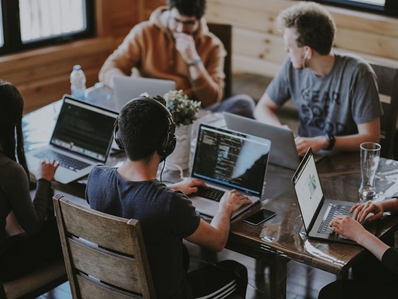 Smart Cyberspace technology team working together in modern office